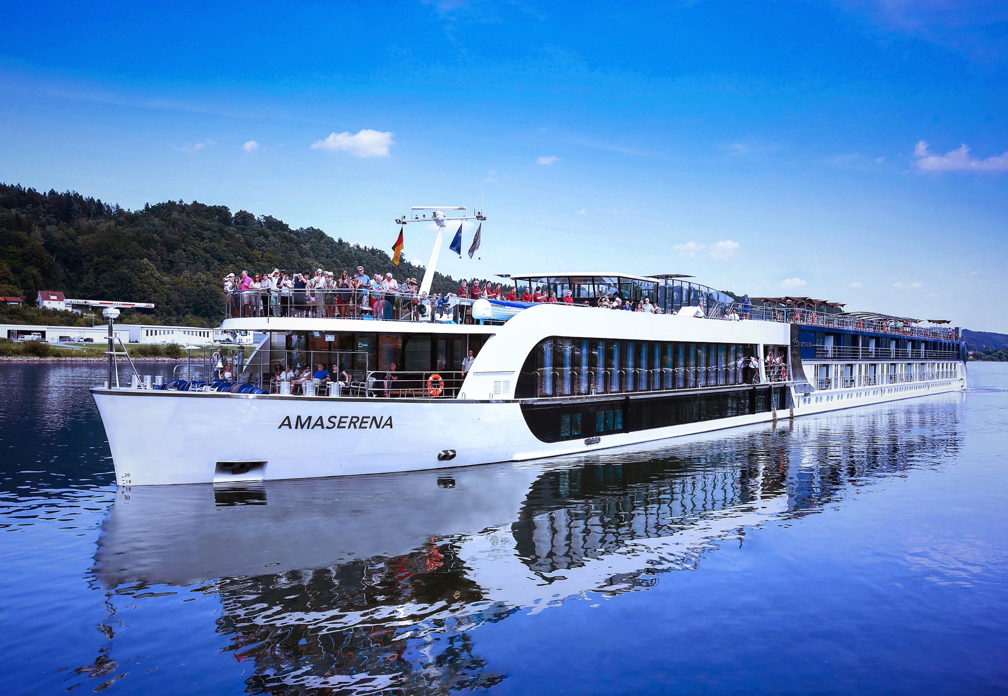 AmaSerena river cruise ship sailing on a scenic European waterway