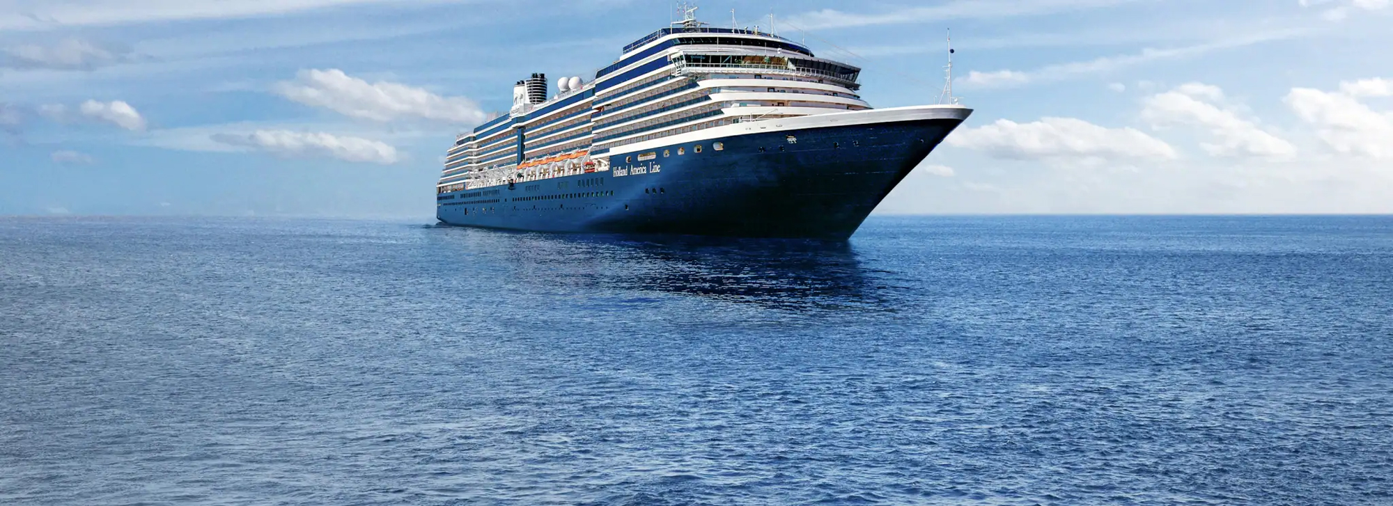 Blue Ocean Cruise Ship Sailing A large, elegant blue cruise ship sailing smoothly across a calm, expansive blue ocean under