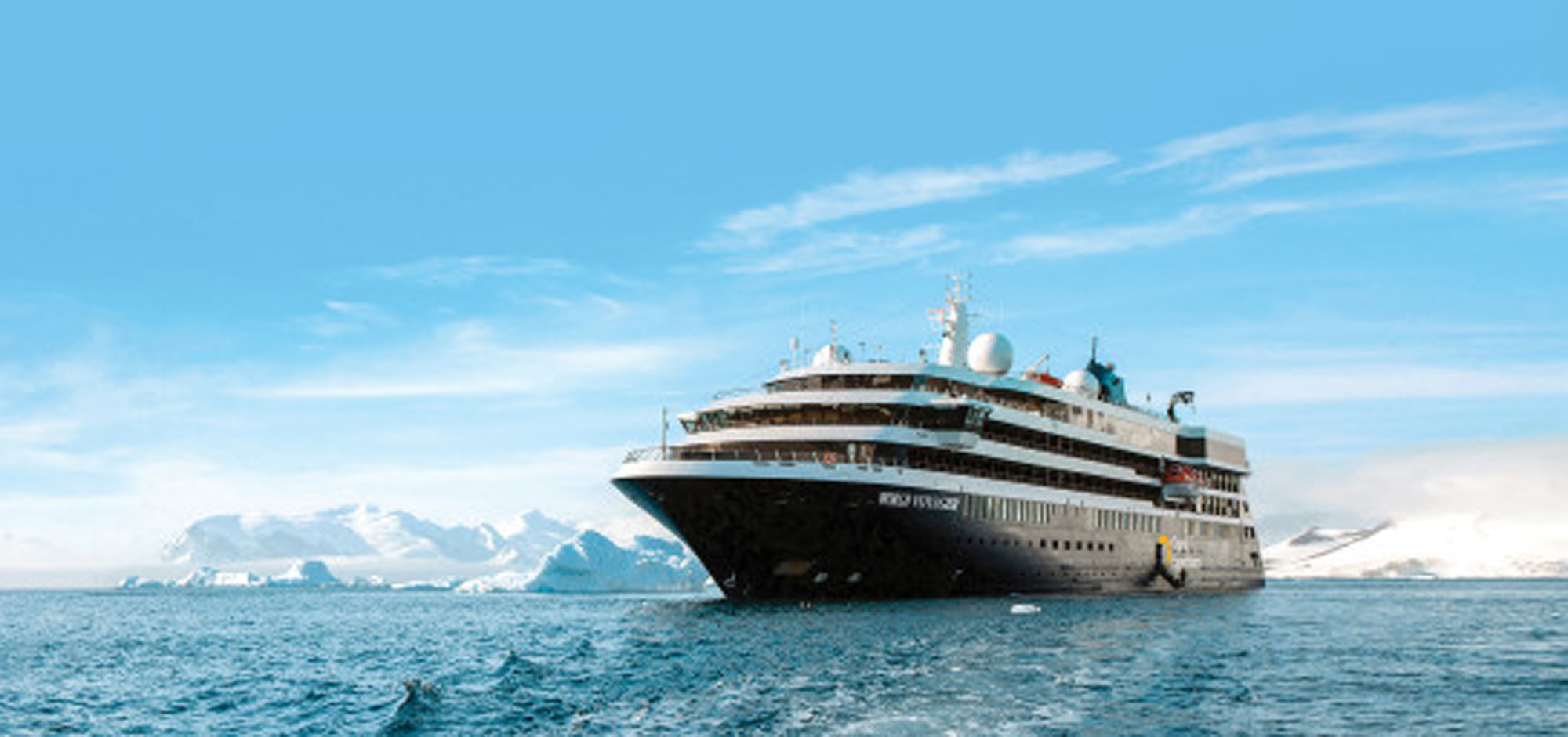 Luxury Expedition Cruise in Antarctic Waters A sleek modern cruise ship navigating through icy blue waters with snow-covered mountains