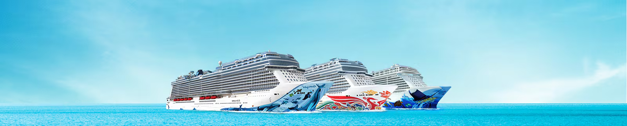 Norwegian Cruise Line Ships at Sea Three modern Norwegian Cruise Line ships sailing on turquoise blue waters, each decorated
