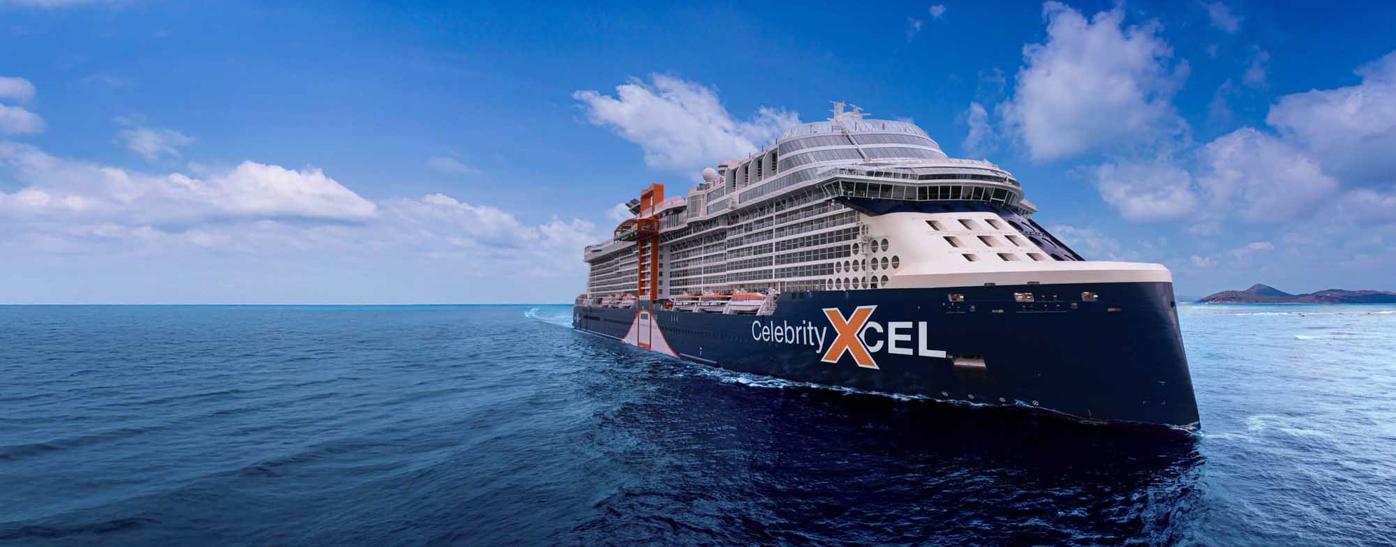 Celebrity Xcel Cruise Ship at Sea The Celebrity Xcel, a modern mega-ship cruise vessel, is photographed anchored in clear blue ocean