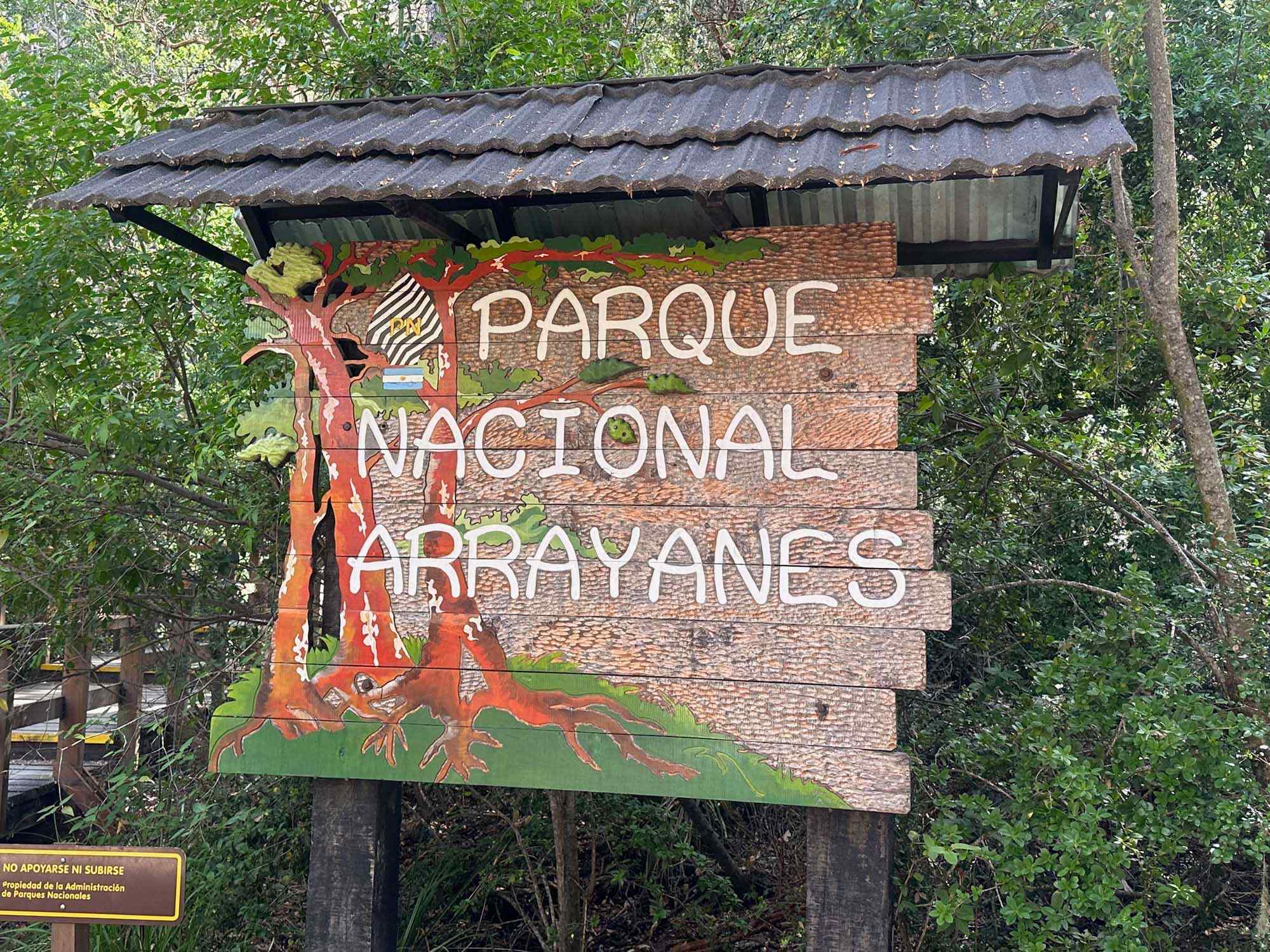 Parque Nacional Arroyanes National Park Entrance Sign A rustic wooden entrance sign for Parque Nacional Arroyanes (Arrayanes National Park) surrounded