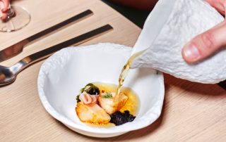 A Closer Look at the Test Kitchen on a Virgin Voyages Ship