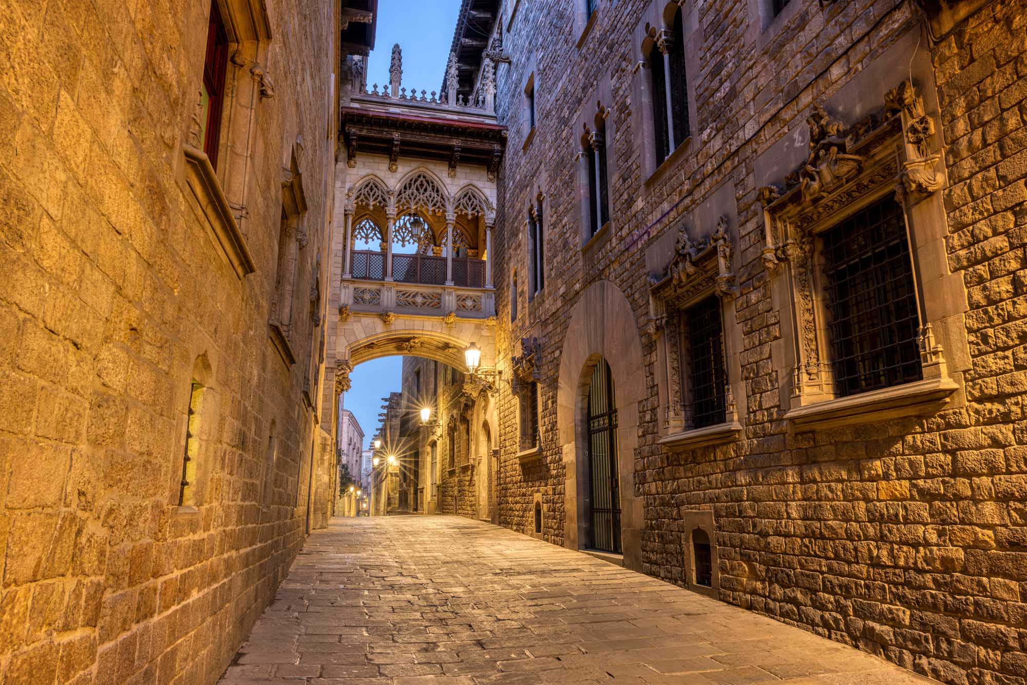 Barrio Gótico Barcelona at Twilight A stunning twilight view of Barcelona's historic Barrio Gótico (Gothic Quarter) featuring