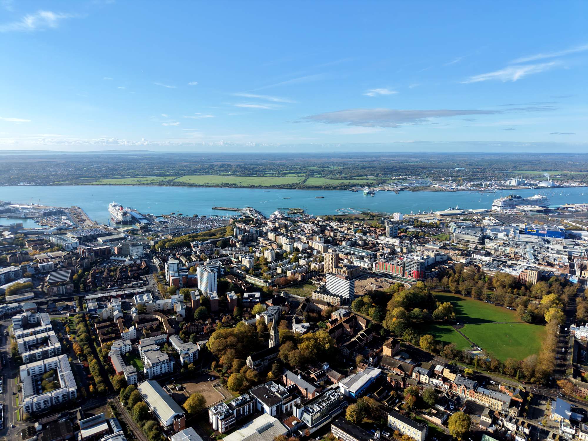 An aerial photograph of Southampton, England, showing the bustling port city with its cruise