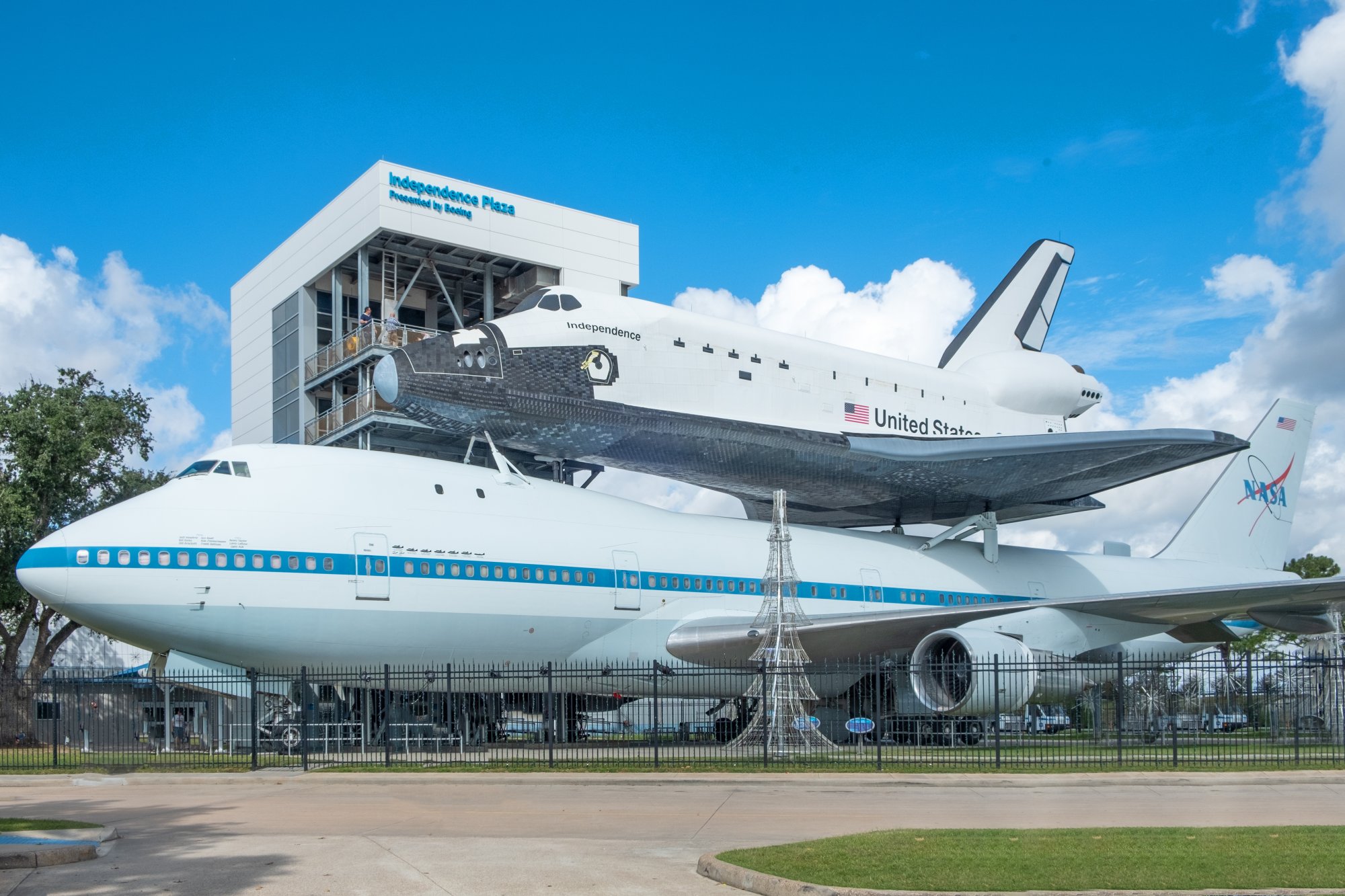 A decommissioned Space Shuttle orbiter named Independence is mounted atop a modified Boeing 747